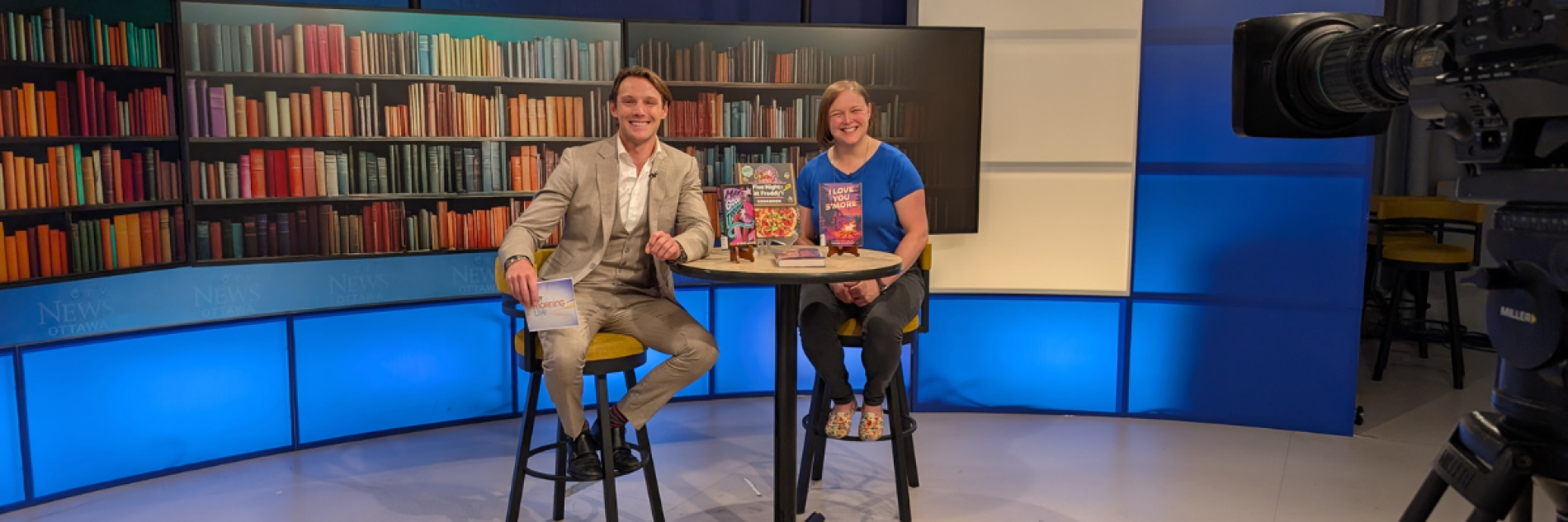 CTV Morning Live host and Library from OPL sitting at a table in front of camera