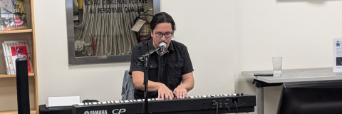 Keith Whiteduck playing on his keyboard. 